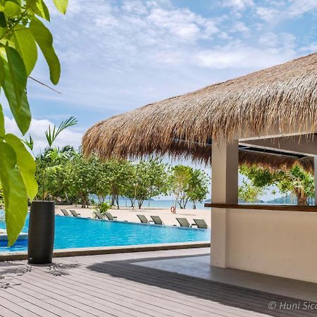 Huni Sicogon Hotel Carles Bagian luar foto