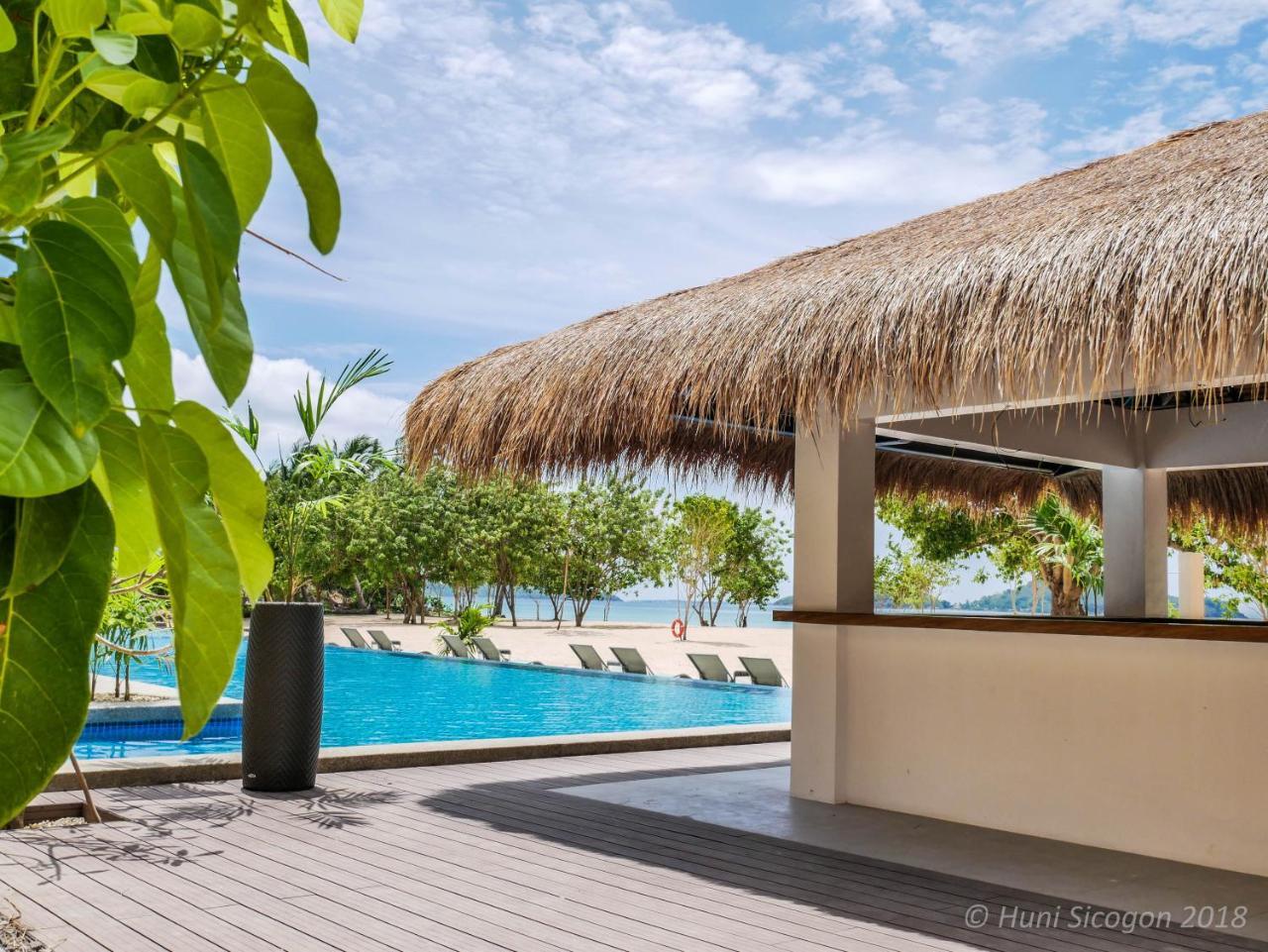 Huni Sicogon Hotel Carles Bagian luar foto