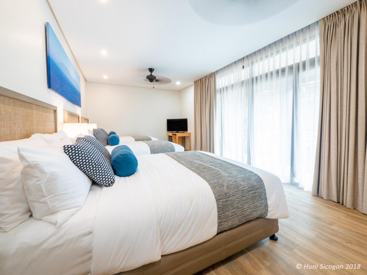 Huni Sicogon Hotel Carles Bagian luar foto
